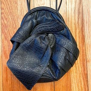 Vintage black leather clamshell